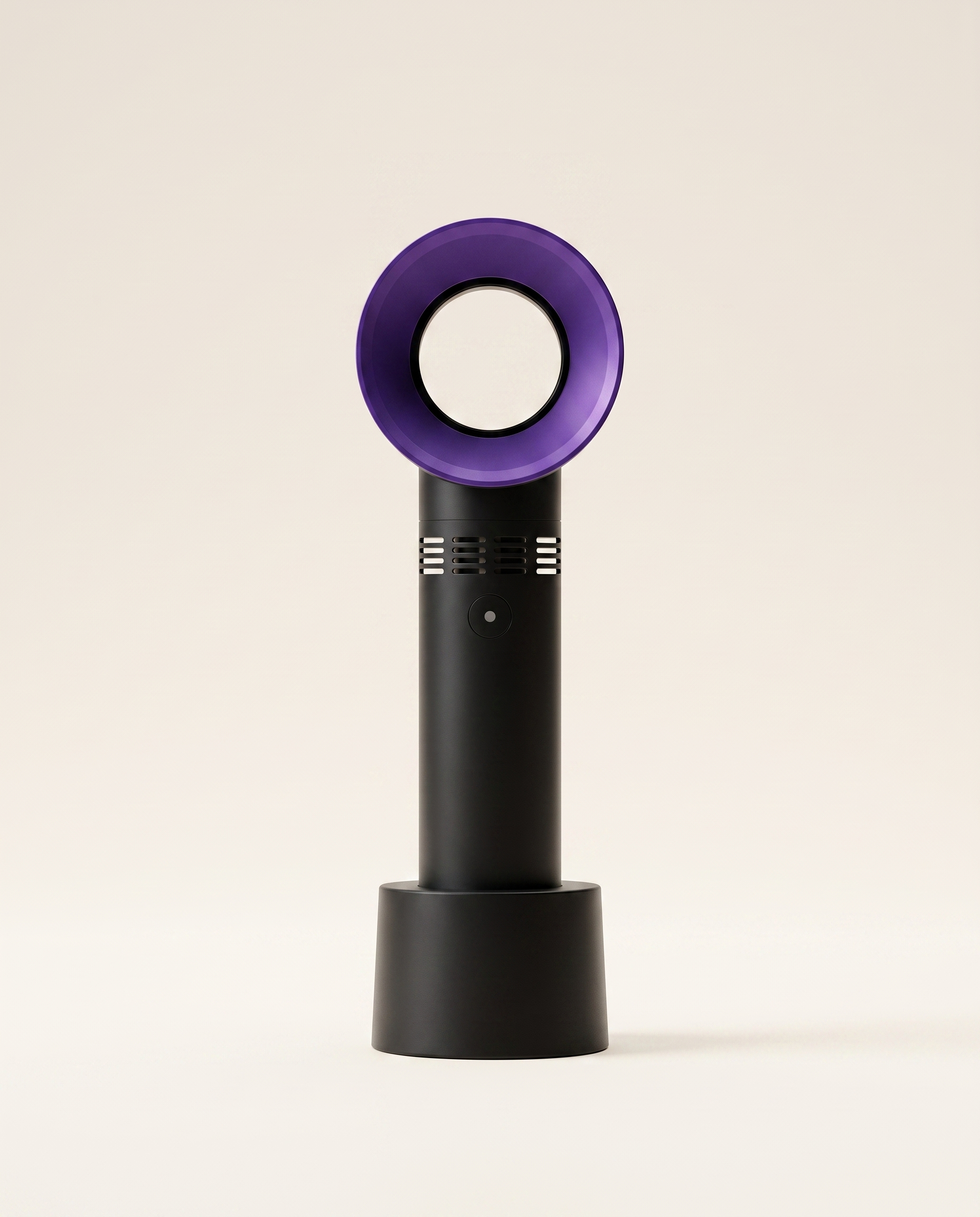 Black bladeless portable USB fan on a warm ivory studio background