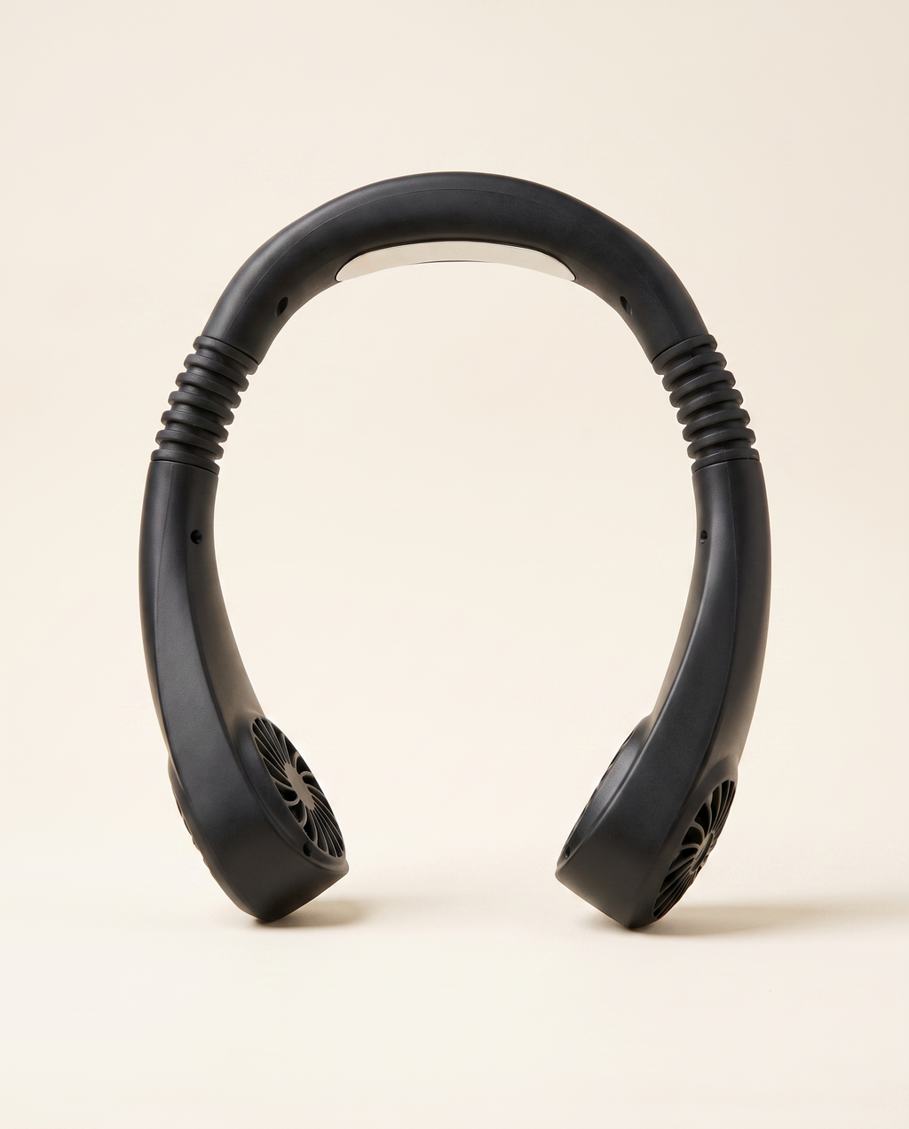 Hands-Free USB Neck Fan in black on a warm ivory studio background