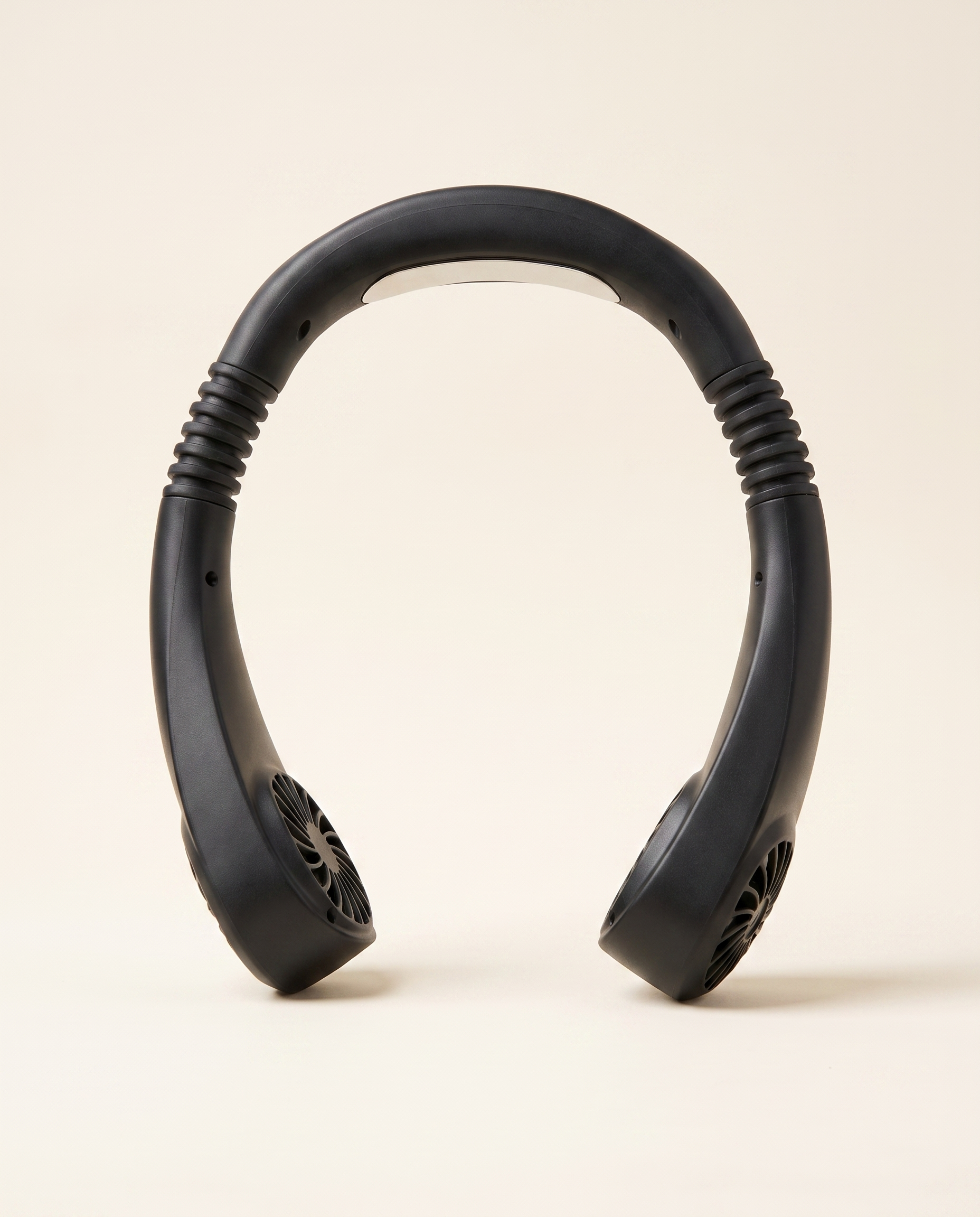 Hands-Free USB Neck Fan in black on a warm ivory studio background
