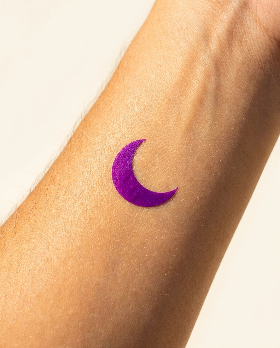 UV reminder sticker turned bright purple in sunlight to signal high UV