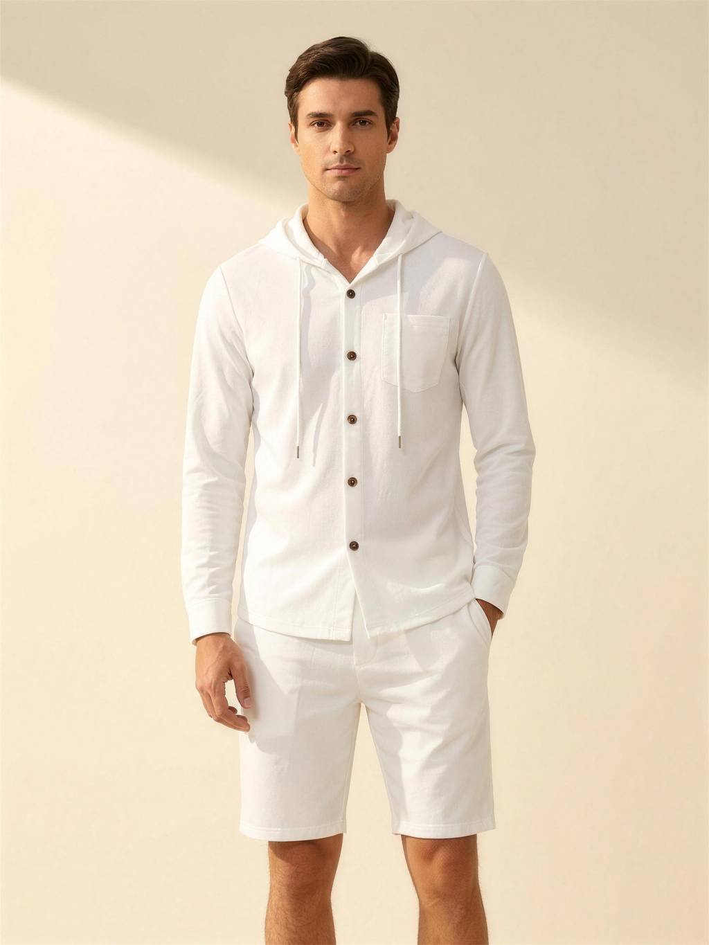 Men's white hooded shirt and matching shorts set, warm ivory studio